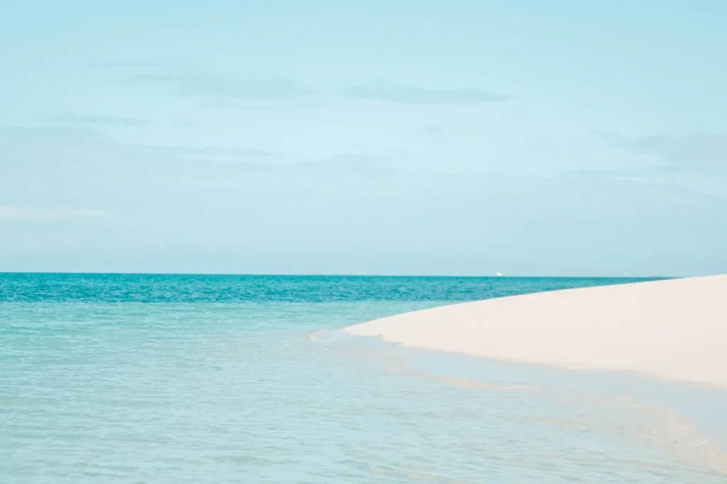 White sand and clear turquoise Indian Ocean water in Zanzibar, Tanzania